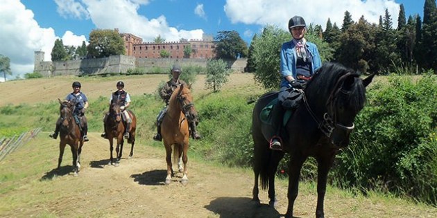 Vier Reiter vor Schloss